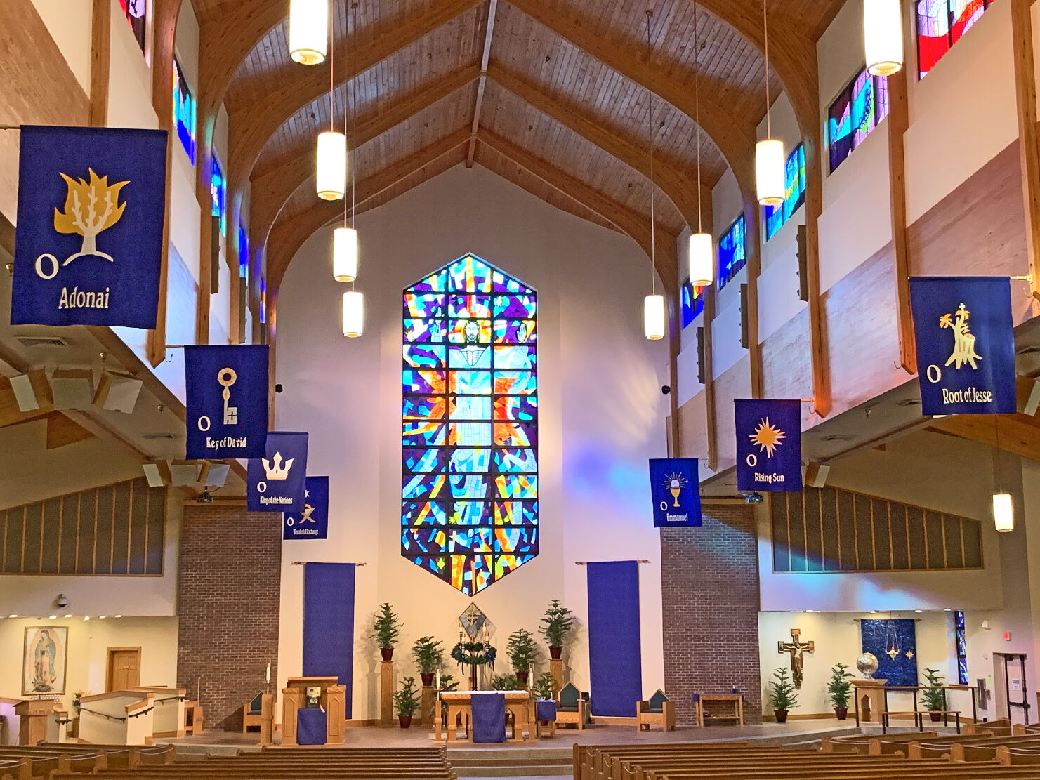 Eight new 42” x 5’ banners inspired by the Benedictine Sisters of Turvey Abbey, hang at St. Patrick Parish in Mount Dora. The parishioner-made banners help the faithful focus on Advent Scripture passages.